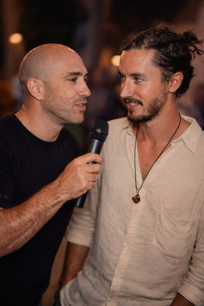 Nick interviewing young man